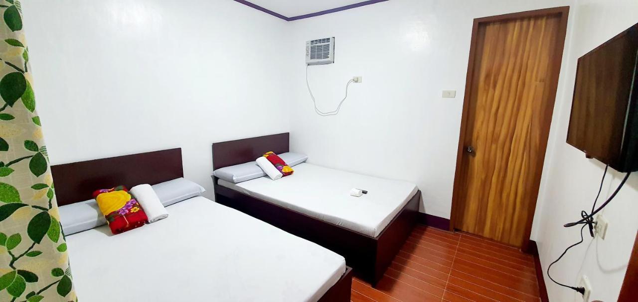 Sj Pabua Travellers Inn Mambajao Exterior foto